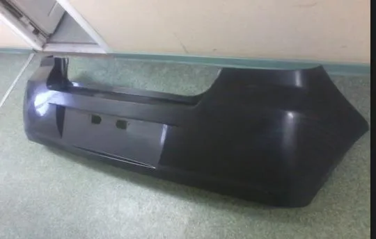 Задній бампер 101800613201 Geely