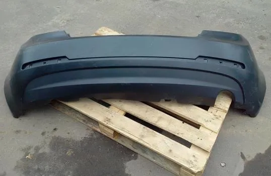 Задній бампер 1068003031 Geely