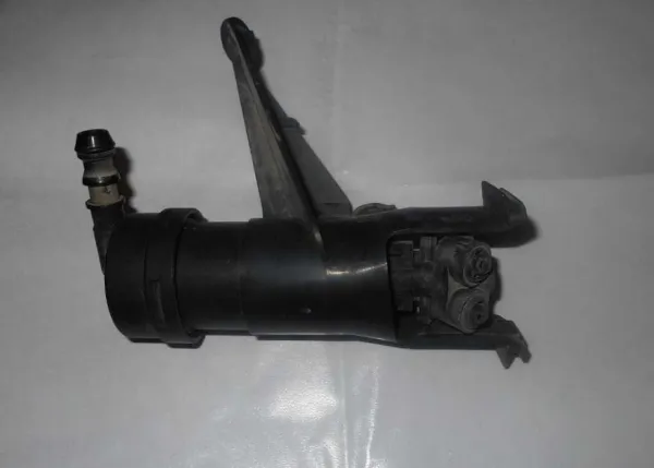 Форсунка омивача фари передньої, лівою TQ21438 Tqparts