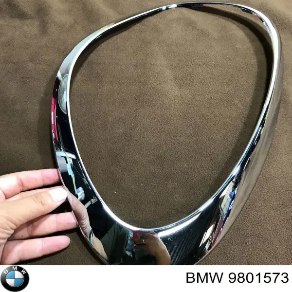 Рамка/облицювання фари лівої 9801573 BMW