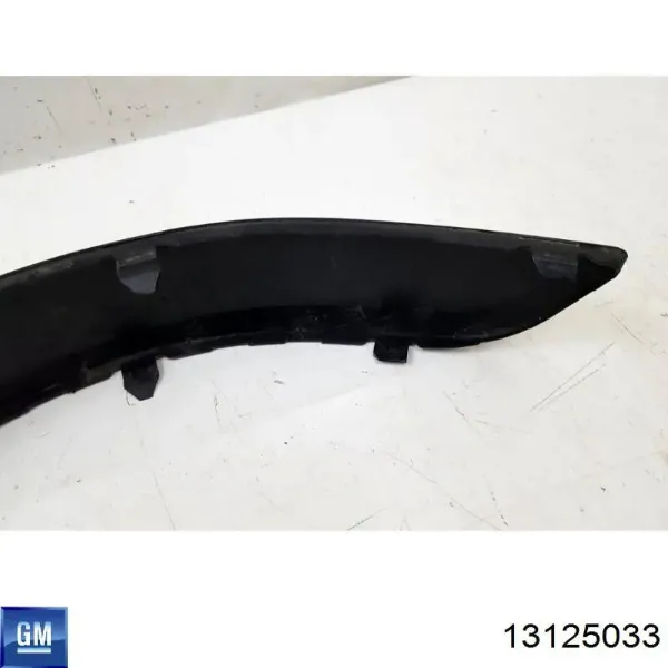 Молдинг заднього бампера, лівий 13125033 General Motors