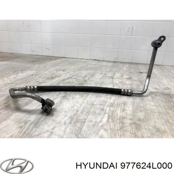 Шланг кондиціонера, від компресора до радіатора 977624L000 Hyundai/Kia