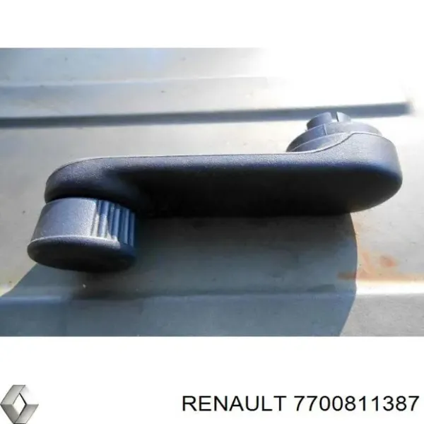 Ручка підйому скла дверей, заднього 7700811387 Renault (RVI)