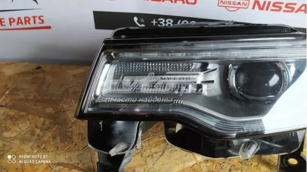 Фара ліва 68111001AC Chrysler
