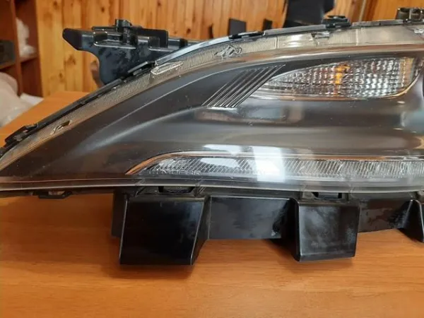 Фара ліва 68110249AE Chrysler
