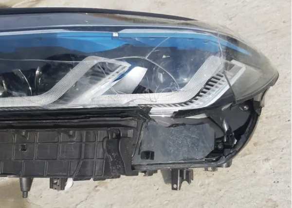 Фара ліва 63119479283 BMW