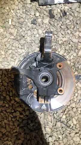 Цапфа - поворотний кулак передній, лівий 400155RF0A Nissan/Infiniti