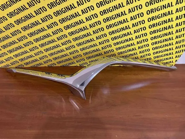 Молдинг решітки радіатора, лівий DGH9507K0B Mazda