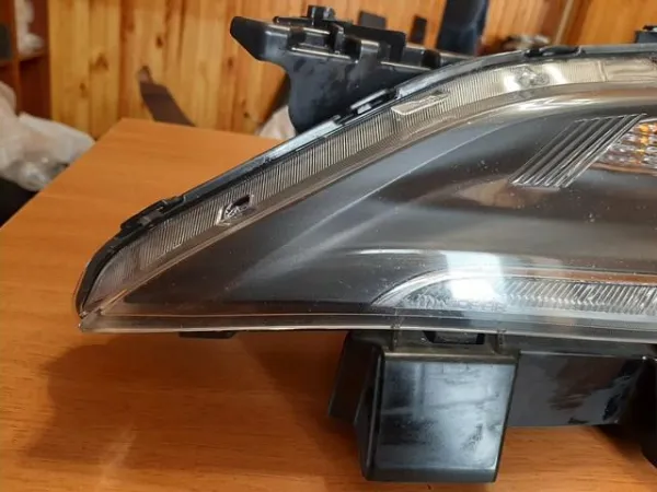 Фара ліва 68110249AE Chrysler