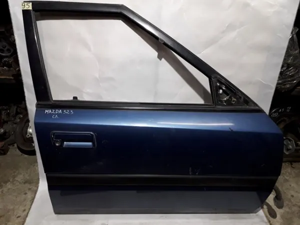 Двері праві передні Mazda 323 F IV