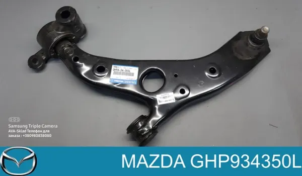 Важіль передньої підвіски нижній, лівий GHP934350L Mazda
