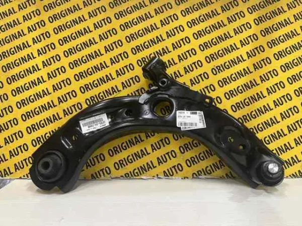 Важіль передньої підвіски нижній, правий DFR534300B Mazda