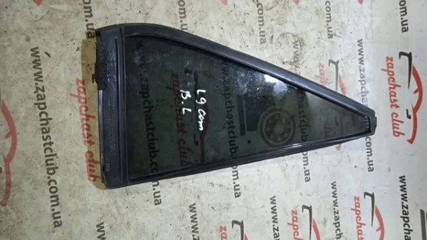 Скло-кватирка двері, задній, лівою MR556413 Mitsubishi