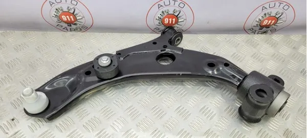 Важіль передньої підвіски нижній, лівий TM5234350B Mazda