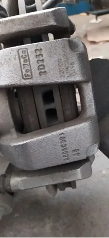 Супорт задній правий L1MZ2552E Ford