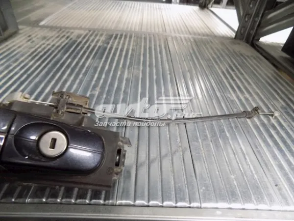 Трос відкривання двері передньої 1480308 Ford