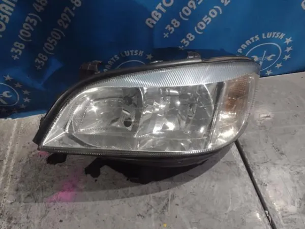 Фара ліва 90582021 Opel