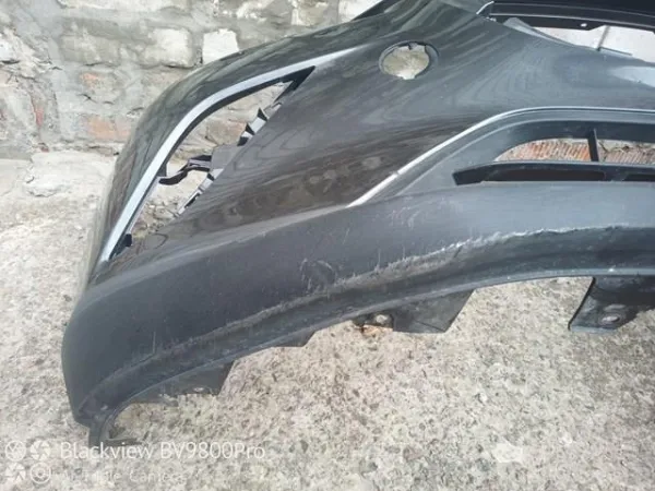 Передній бампер DD2F50031CBB Mazda