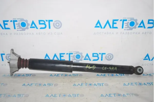 Амортизатор задній TK5028910J Mazda