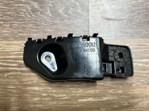 Направляюча переднього бампера, ліва KMV6500U1 Mazda