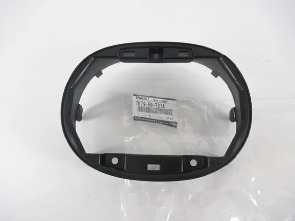 Емблема решітки радіатора TK7950721A Mazda