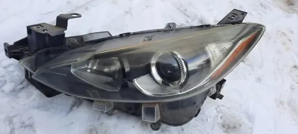 Фара ліва B45A51040 Mazda