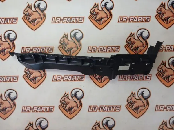 Направляюча заднього бампера, ліва LR121475 Land Rover