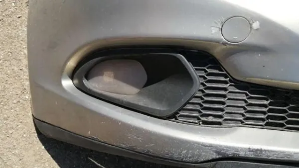 Заглушка/ решітка протитуманних фар бампера переднього, права 86564A2000 Hyundai/Kia