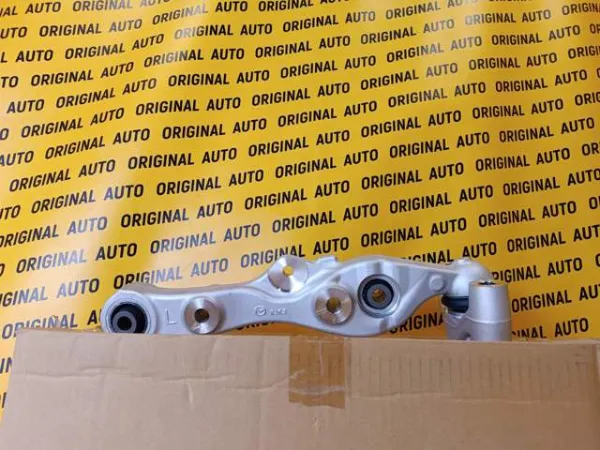 Важіль передньої підвіски нижній, лівий KJK334350A Mazda