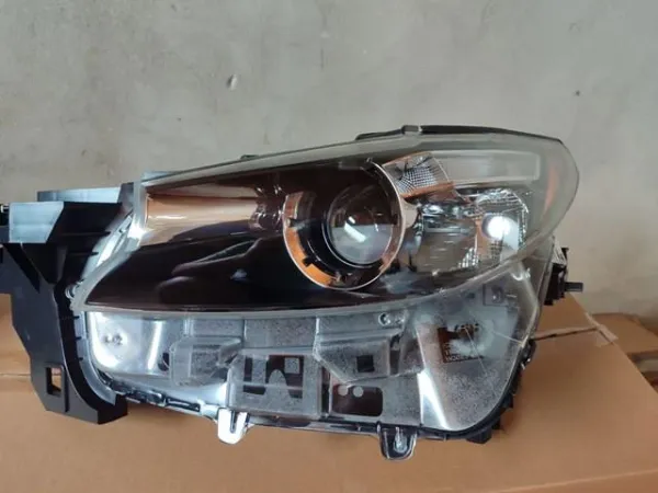 Фара ліва TM52510L0C Mazda