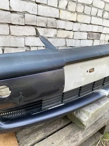 Передній бампер 90464527 General Motors